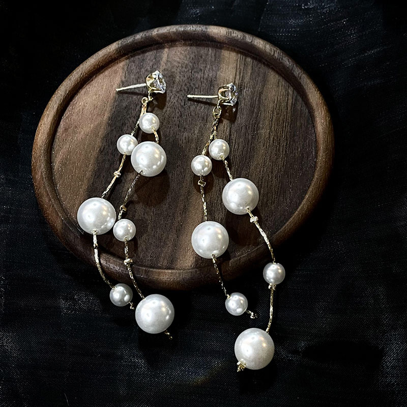 科技與時尚完美融合，最新長款珍珠耳飾款式亮相！